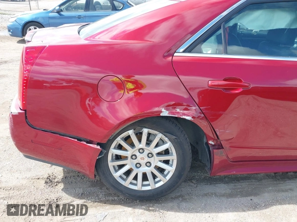 2011 Cadillac CTS with VIN 1G6DC5EY2B0143073, listed as a IAAI auction lot 42322497 with 133,992 mi miles and . Bid and sale history available at DreamBid. Image 6.