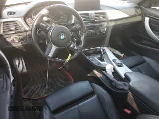 2015 BMW 4 Series 428i xDrive with VIN WBA3N5C5XFK197692, listed as a Copart auction lot 77219684 with 96,148 mi miles and Salvage title. Bid and sale history available at DreamBid. Image 8.