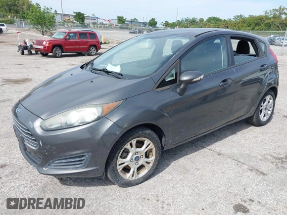 2016 Ford Fiesta SE with VIN 3FADP4EJ4GM129006, listed as a IAAI auction lot 42085892 with 146,044 mi miles. Bid and sale history available at carsss.com. Image 2.