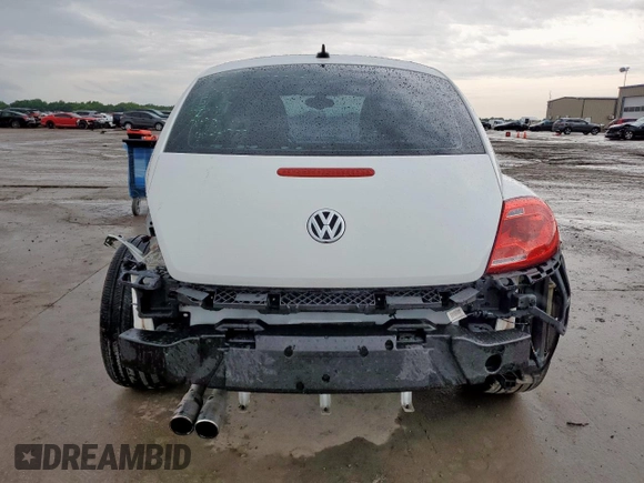 2014 Volkswagen Beetle 1.8T z VIN 3VWJ17AT5EM652990, wystawiony jako Copart lot #60094715 z przebiegiem 109 911 mil mil oraz Szkoda całkowita • Salvage title. Historia ofert i sprzedaży dostępna na DreamBid. Obrazek 6.