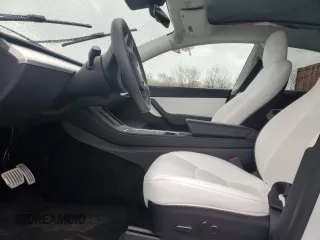 2022 Tesla Model Y Performance with VIN 7SAYGDEF1NF403693, listed as a Copart auction lot 53575845 with 34,302 mi miles and Salvage title. Bid and sale history available at DreamBid. Image 7.