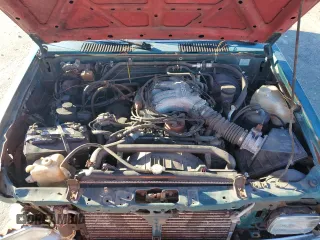 1995 Nissan Frontier XE z VIN 1N6HD16S9SC465896, wystawiony jako Copart lot #81665514 z przebiegiem 212 893 mil mil oraz Szkoda całkowita • Salvage title. Historia ofert i sprzedaży dostępna na DreamBid. Obrazek 11.