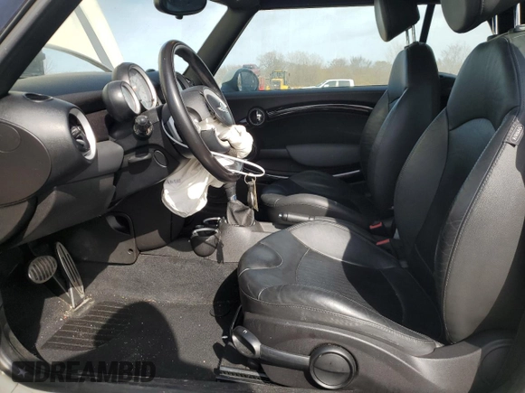 2010 MINI Convertible S with VIN WMWMS3C51ATZ85166, listed as a Copart auction lot 52907775 with 90,090 mi miles and Salvage title. Bid and sale history available at DreamBid. Image 7.