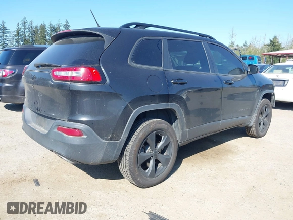 2015 Jeep Cherokee North with VIN 1C4PJMCS3FW777973, listed as a IAAI auction lot 42043203 with 158,536 mi miles. Bid and sale history available at carsss.com. Image 4.