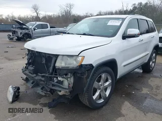 2013 Jeep Grand Cherokee Overland with VIN 1C4RJECG5DC648593, listed as a IAAI auction lot 41576630 with 187,098 mi miles. Bid and sale history available at carsss.com. Image 18.