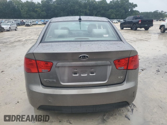 2010 Kia Forte EX with VIN KNAFU4A21A5199583, listed as a Copart auction lot 71681954 with 185,329 mi miles and Salvage Title. Bid and sale history available at carsss.com. Image 6.