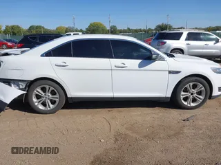 2016 Ford Taurus SEL with VIN 1FAHP2E84GG102031, listed as a IAAI auction lot 40597227 with 167,410 mi miles and . Bid and sale history available at DreamBid. Image 13.
