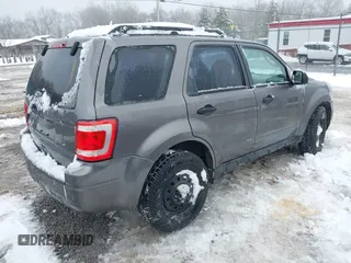 2012 Ford Escape XLS z VIN 1FMCU9C72CKA10130, wystawiony jako IAAI lot #41543233 z przebiegiem 168 552 mil mil oraz . Historia ofert i sprzedaży dostępna na DreamBid. Obrazek 4.