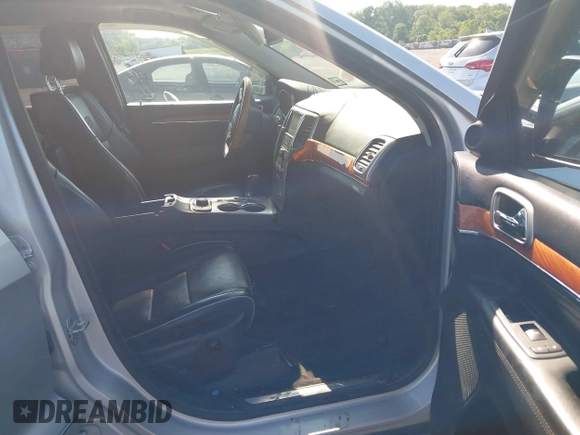 2011 Jeep Grand Cherokee Overland Summit with VIN 1J4RR6GT9BC535985, listed as a IAAI auction lot 42556913 with 108,845 mi miles and . Bid and sale history available at DreamBid. Image 5.