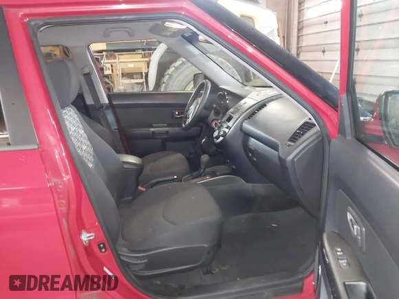 2011 Kia Soul + with VIN KNDJT2A23B7329051, listed as a IAAI auction lot 41963566 with 146,063 mi miles. Bid and sale history available at carsss.com. Image 5.