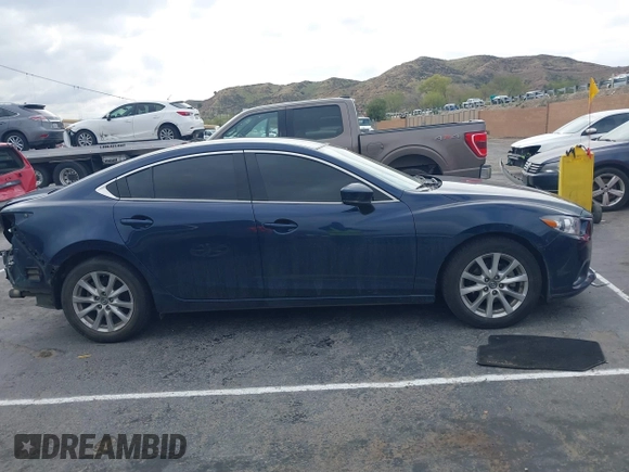 2017 Mazda 6 Sport with VIN JM1GL1U51H1156104, listed as a IAAI auction lot 41769388 with 121,405 mi miles and . Bid and sale history available at DreamBid. Image 14.