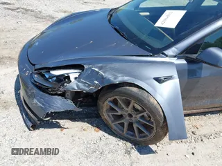 2023 Tesla Model 3 z VIN 5YJ3E1EA0PF655244, wystawiony jako IAAI lot #42004592 z przebiegiem 54 860 mil mil oraz . Historia ofert i sprzedaży dostępna na DreamBid. Obrazek 6.