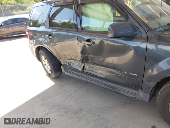 2009 Ford Escape Hybrid with VIN 1FMCU59389KB08343, listed as a IAAI auction lot 42520392 with 171,864 mi miles and . Bid and sale history available at DreamBid. Image 6.