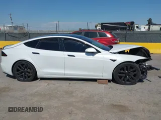 2023 Tesla Model S with VIN 5YJSA1E59PF500816, listed as a IAAI auction lot 42409049 with Not provided miles and . Bid and sale history available at DreamBid. Image 13.
