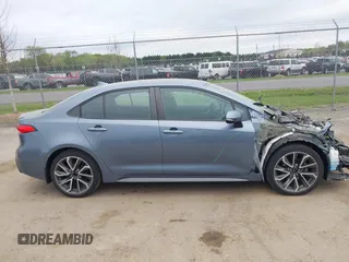 2020 Toyota Corolla SE with VIN 5YFS4RCE5LP056583, listed as a IAAI auction lot 42063358 with 58,027 mi miles and . Bid and sale history available at DreamBid. Image 13.