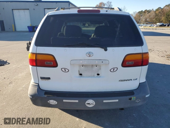 2000 Toyota Sienna LE with VIN 4T3ZF13C5YU201708, listed as a Copart auction lot 83924024 with 219,940 mi miles and Salvage Title. Bid and sale history available at DreamBid. Image 6.