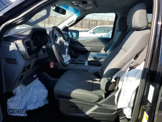 2024 Ford F-150 XLT with VIN 1FTFW3LD1RFA75938, listed as a Copart auction lot 78947444 with 14,674 mi miles and Salvage Title. Bid and sale history available at carsss.com. Image 7.
