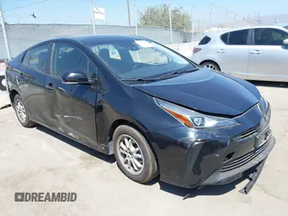 2020 Toyota Prius L Eco z VIN JTDKARFU1L3117772, wystawiony jako IAAI lot #40077005 z przebiegiem 71 892 mil mil oraz . Historia ofert i sprzedaży dostępna na DreamBid. Obrazek 1.