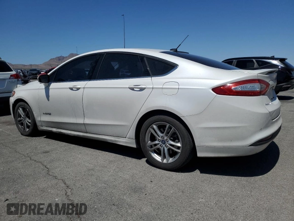 2016 Ford Fusion SE Hybrid с VIN 3FA6P0LU4GR259692, выставлен на аукционе Copart как лот 57100415 с пробегом 154 051 миль миль и Списание • Salvage title. История ставок и продаж доступна на DreamBid. Изображение 2.