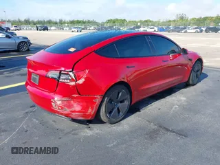 2023 Tesla Model 3 with VIN 5YJ3E1EA2PF588467, listed as a IAAI auction lot 42254921 with 11,217 mi miles and . Bid and sale history available at DreamBid. Image 4.