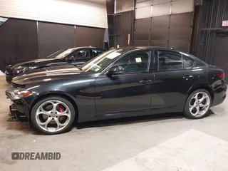 2021 Alfa Romeo Giulia Ti z VIN ZARFANBN7M7644482, wystawiony jako IAAI lot #42502199 z przebiegiem 27 962 mil mil oraz . Historia ofert i sprzedaży dostępna na DreamBid. Obrazek 15.