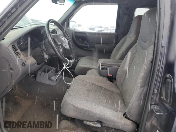 2001 Ford Ranger XLT Appearance with VIN 1FTYR14E11PA62827, listed as a Copart auction lot 87845045 with 142,748 mi miles and Salvage Title. Bid and sale history available at DreamBid. Image 7.