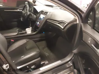2020 Ford Fusion Hybrid Titanium with VIN 3FA6P0RU8LR141355, listed as a IAAI auction lot 41417807 with 61,288 mi miles. Bid and sale history available at carsss.com. Image 5.
