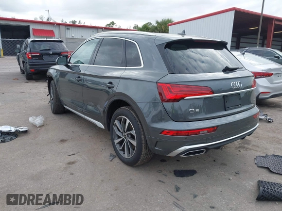 2023 Audi Q5 S line Premium Plus z VIN WA1EAAFY6P2161080, wystawiony jako IAAI lot #41282613 z przebiegiem 20 268 mil mil oraz . Historia ofert i sprzedaży dostępna na DreamBid. Obrazek 3.