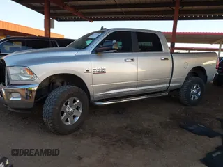 2014 Ram 2500 Big Horn with VIN 3C6UR5DL4EG114294, listed as a IAAI auction lot 42035021 with 140,477 mi miles. Bid and sale history available at carsss.com. Image 2.