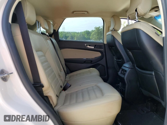 2019 Ford Edge SEL with VIN 2FMPK4J99KBC60200, listed as a Copart auction lot 58301455 with 119,040 mi miles and Salvage title. Bid and sale history available at DreamBid. Image 11.