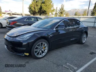2018 Tesla Model 3 Long Range Battery with VIN 5YJ3E1EA2JF171602, listed as a Copart auction lot 50101925 with 70,738 mi miles and Salvage Title. Bid and sale history available at carsss.com. Image 1.