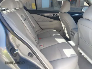 2015 Infiniti Q50 Premium with VIN JN1BV7AP3FM358244, listed as a IAAI auction lot 42063278 with 98,873 mi miles and . Bid and sale history available at DreamBid. Image 8.
