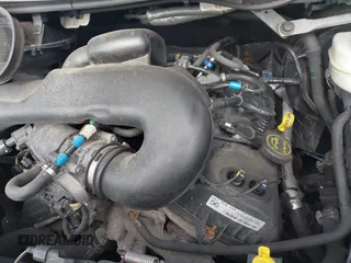 2018 Ford Transit Passenger XL z VIN 1FBZX2CMXJKA07321, wystawiony jako IAAI lot #41373858 z przebiegiem 197 135 mil mil oraz . Historia ofert i sprzedaży dostępna na DreamBid. Obrazek 10.