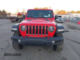 2022 Jeep Wrangler Unlimited Rubicon with VIN 1C4HJXFN4NW261809, listed as a IAAI auction lot 41459519 with 30,422 mi miles and . Bid and sale history available at DreamBid. Image 12.