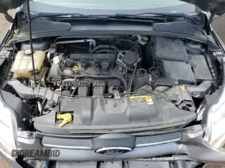 2012 Ford Focus SE z VIN 1FAHP3F23CL455216, wystawiony jako Copart lot #64894855 z przebiegiem 126 204 mil mil oraz Szkoda całkowita • Salvage title. Historia ofert i sprzedaży dostępna na DreamBid. Obrazek 11.