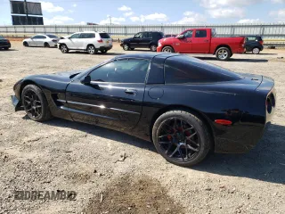 2002 Chevrolet Corvette with VIN 1G1YY22G425127253, listed as a Copart auction lot 74689014 with 68,080 mi miles and Salvage Title. Bid and sale history available at carsss.com. Image 2.