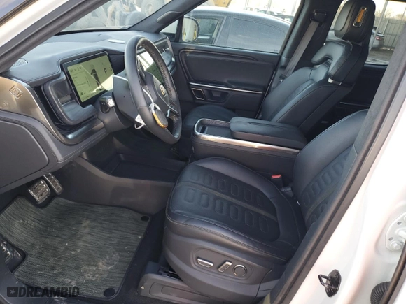 2023 Rivian R1T Adventure with VIN 7FCTGAAA9PN021913, listed as a Copart auction lot 46222995 with 41,888 mi miles and Salvage Title. Bid and sale history available at carsss.com. Image 7.