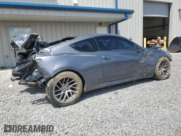 2014 Hyundai Genesis Coupe Ultimate z VIN KMHHU6KJ3EU118958, wystawiony jako Copart lot #56551845 z przebiegiem 149 695 mil mil oraz Szkoda całkowita • Salvage title. Historia ofert i sprzedaży dostępna na DreamBid. Obrazek 3.