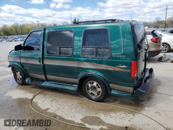 1998 GMC Safari z VIN 1GDDM19WXWB540497, wystawiony jako Copart lot #50780655 z przebiegiem 115 575 mil mil oraz Nie do naprawy. Historia ofert i sprzedaży dostępna na DreamBid. Obrazek 2.