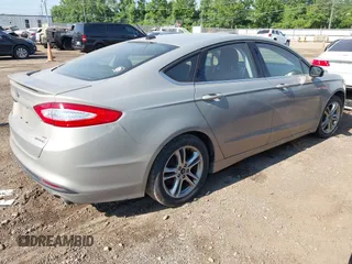 2015 Ford Fusion SE Hybrid with VIN 3FA6P0LU7FR243498, listed as a IAAI auction lot 42719986 with 345,098 mi miles and . Bid and sale history available at DreamBid. Image 4.