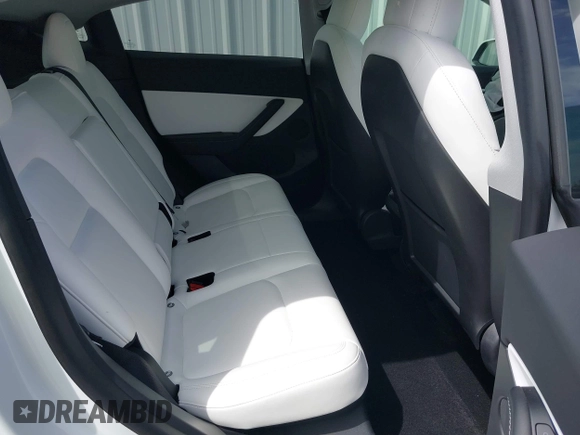 2021 Tesla Model Y Long Range with VIN 5YJYGDEE1MF152256, listed as a IAAI auction lot 42004769 with 35,176 mi miles. Bid and sale history available at carsss.com. Image 8.