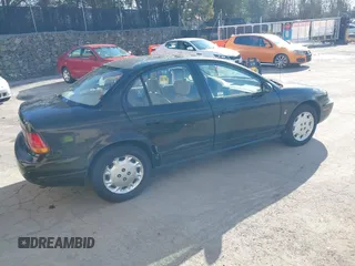 1997 Saturn SL with VIN 1G8ZK5270VZ280153, listed as a IAAI auction lot 40958843 with 40,013 mi miles and . Bid and sale history available at DreamBid. Image 4.