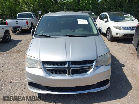 2012 Dodge Grand Caravan SXT with VIN 2C4RDGCG8CR139963, listed as a IAAI auction lot 42243745 with 185,730 mi miles and . Bid and sale history available at DreamBid. Image 6.