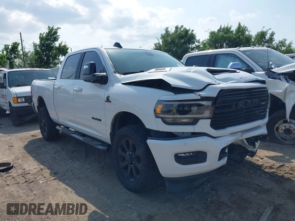 2023 Ram 2500 Laramie with VIN 3C6UR5FL3PG517960, listed as a IAAI auction lot 42128355 with 101,733 mi miles and . Bid and sale history available at DreamBid. Image 1.