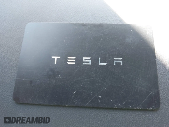 2022 Tesla Model Y Long Range with VIN 7SAYGDEE1NF402745, listed as a IAAI auction lot 41493850 with 11,222 mi miles and . Bid and sale history available at DreamBid. Image 11.