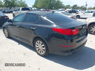 2014 Kia Optima EX with VIN 5XXGN4A72EG294381, listed as a IAAI auction lot 41944473 with 119,781 mi miles and . Bid and sale history available at carsss.com. Image 3.