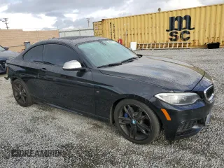 2014 BMW 2 Series M235i with VIN WBA1J7C55EVW84665, listed as a Copart auction lot 44257115 with 111,461 mi miles and Salvage title. Bid and sale history available at DreamBid. Image 4.