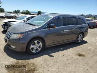 2012 Honda Odyssey Touring with VIN 5FNRL5H99CB109223, listed as a Copart auction lot 63901595 with 291,715 mi miles and Clean title. Bid and sale history available at DreamBid. Image 1.
