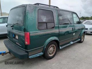 1997 GMC Safari z VIN 1GDDM19W5VB544214, wystawiony jako Copart lot #74226704 z przebiegiem Nie podano mil oraz Szkody całkowita. Historia ofert i sprzedaży dostępna na DreamBid. Obrazek 3.