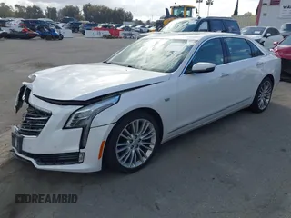 2016 Cadillac CT6 Luxury AWD with VIN 1G6KD5RSXGU154557, listed as a IAAI auction lot 41550199 with 102,536 mi miles and . Bid and sale history available at DreamBid. Image 2.